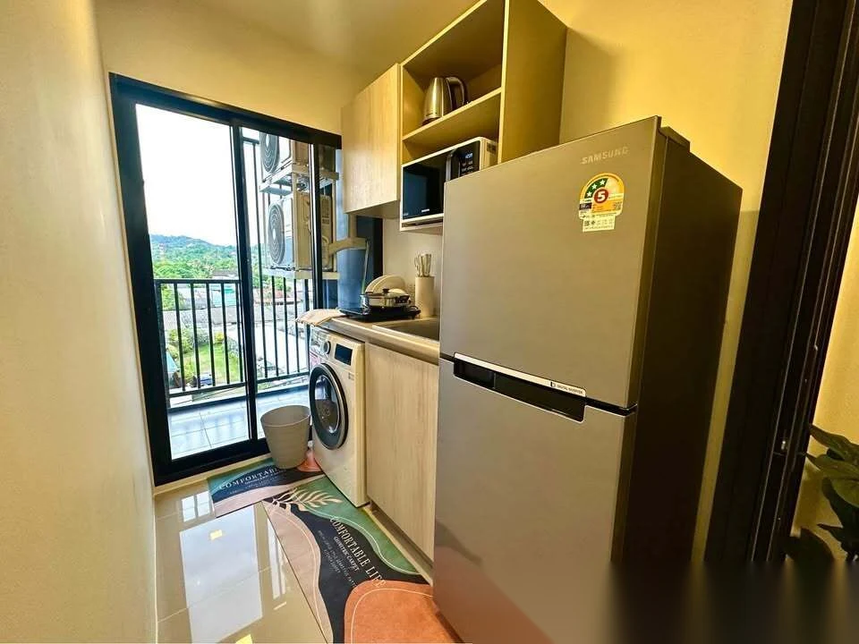 1 Bedroom Apartment for rent at Dcondo Reef Phuket complex · Kathu · Pool View — photo 5