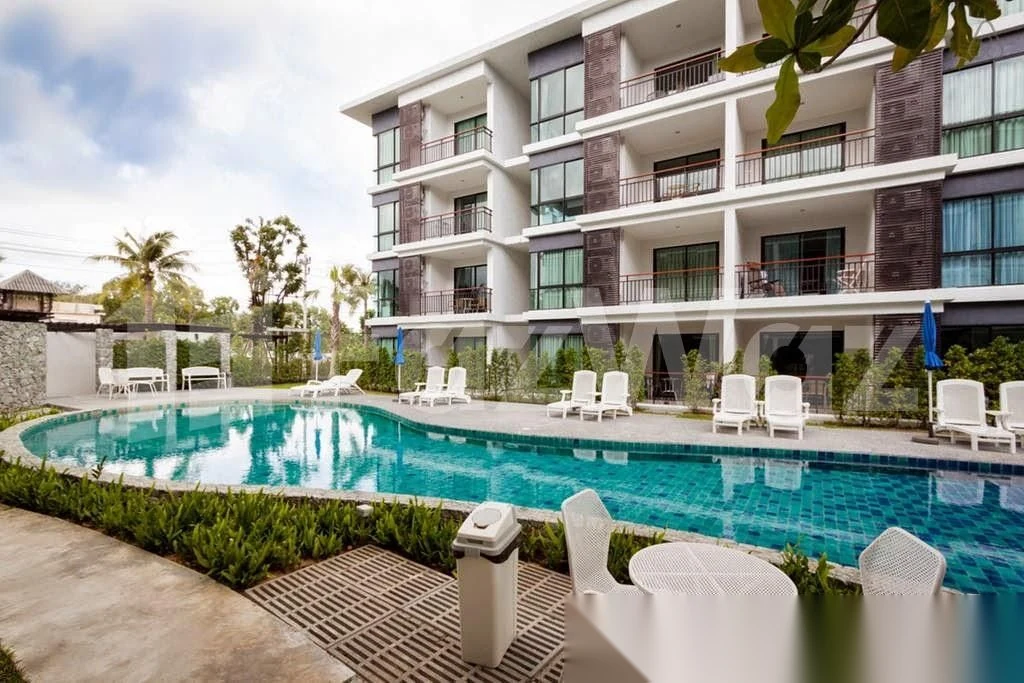 Апартаменты 1BR в ЖК The Title Rawai Phase 1-2 · Раваи · Вид в сад