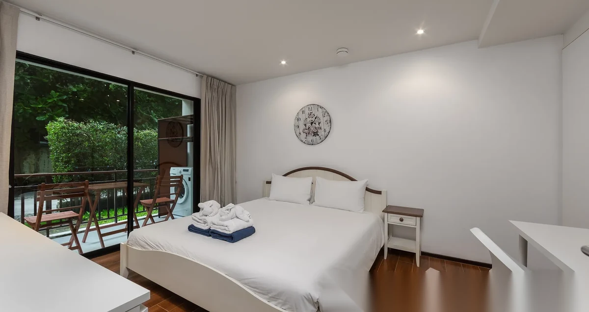Апартаменты 1BR в ЖК The Title Rawai Phase 1-2 · Раваи · Вид в сад — фото 2