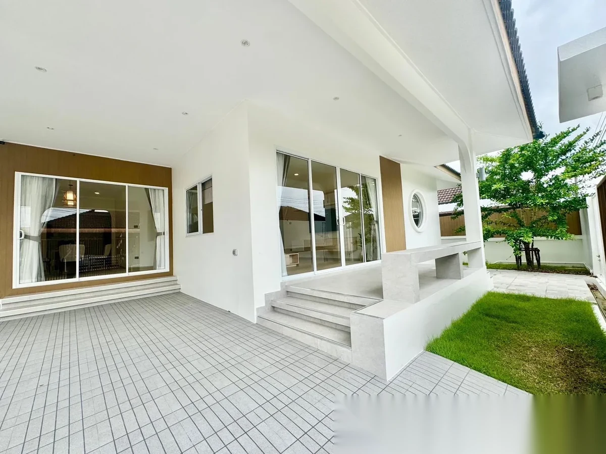 3 Bedroom House for rent at Baan Suan Neramit 5 complex · Si Sunthon · Garden View — photo 2