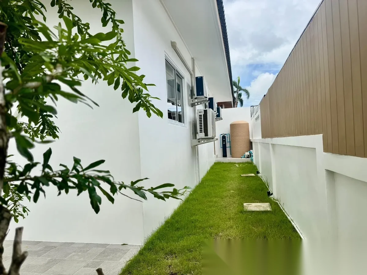 3 Bedroom House for rent at Baan Suan Neramit 5 complex · Si Sunthon · Garden View — photo 4