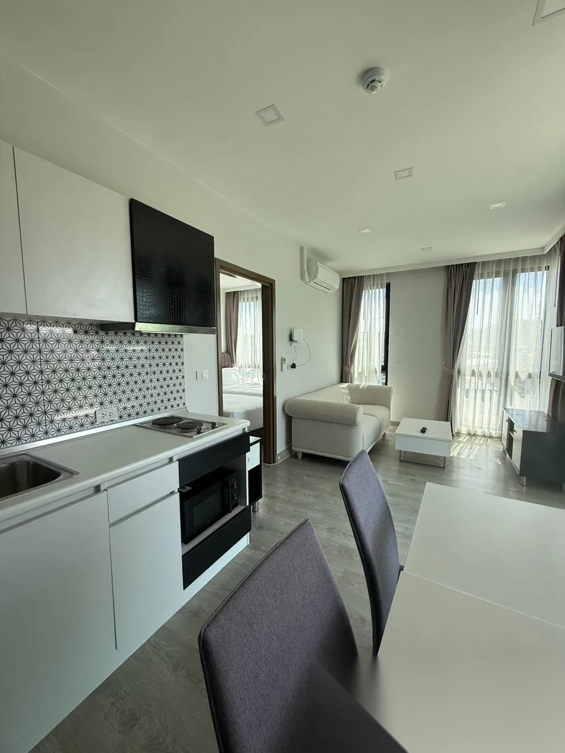 Апартаменты 1BR в ЖК Royal Lee The Terminal Phuket · Саку · Вид на озеро — фото 2
