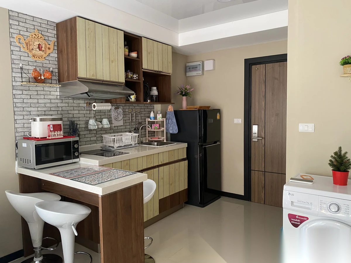 Studio Apartment for sale at Nai Harn Beach Condominium complex · Rawai · Garden View — photo 8