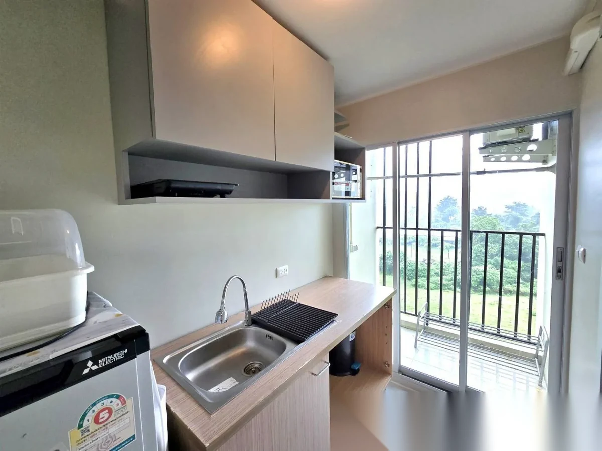 1 Bedroom Apartment for rent at D Condo Kathu-Patong complex · Kathu · Pool View — photo 3