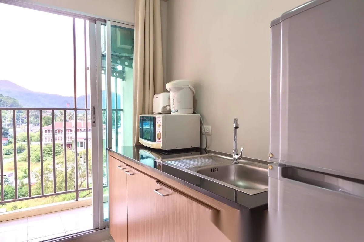 1 Bedroom Apartment for rent at D Condo Kathu-Patong complex · Kathu · Pool View — photo 5