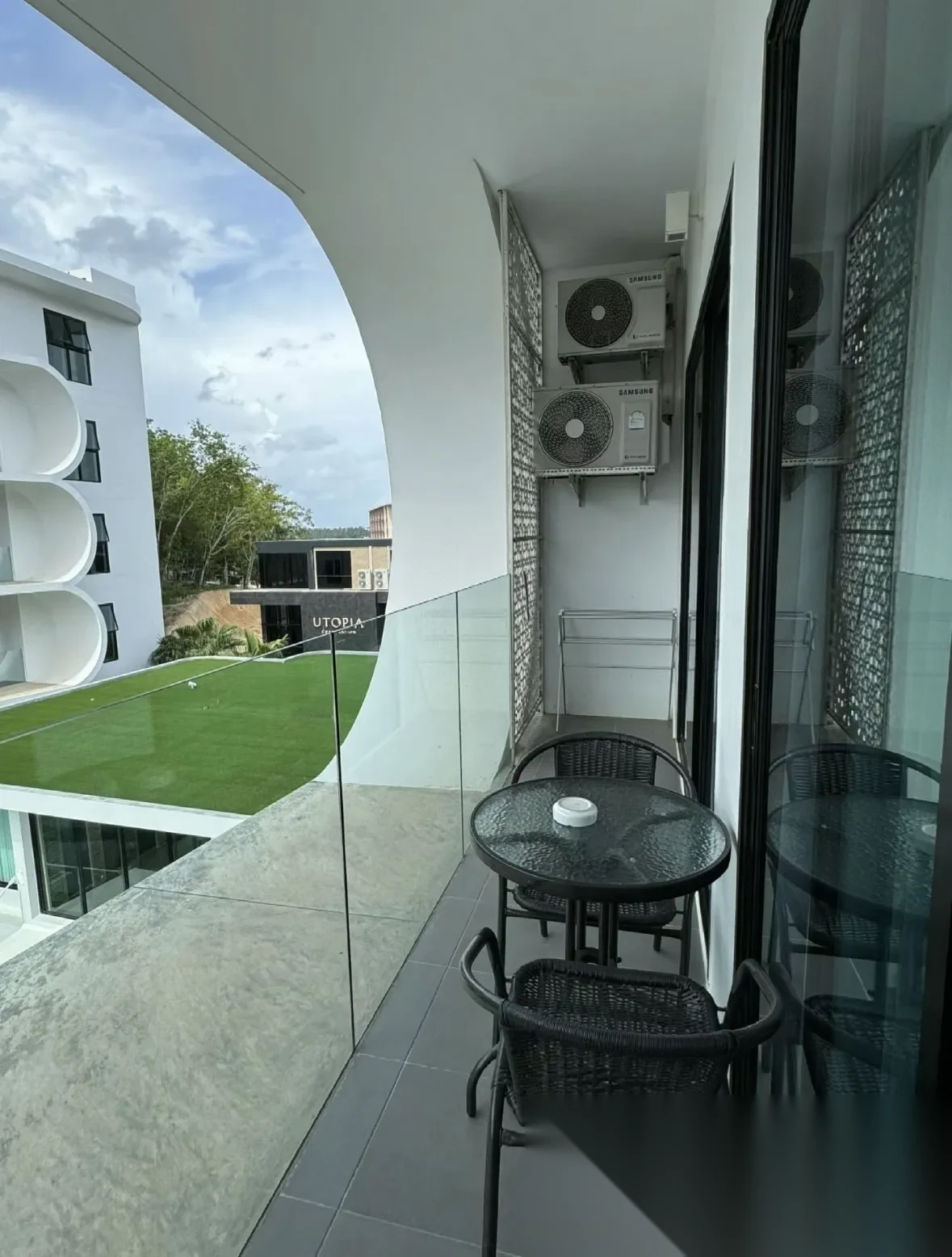 Апартаменты 1BR в ЖК Utopia Naiharn · Раваи · Вид в сад — фото 2