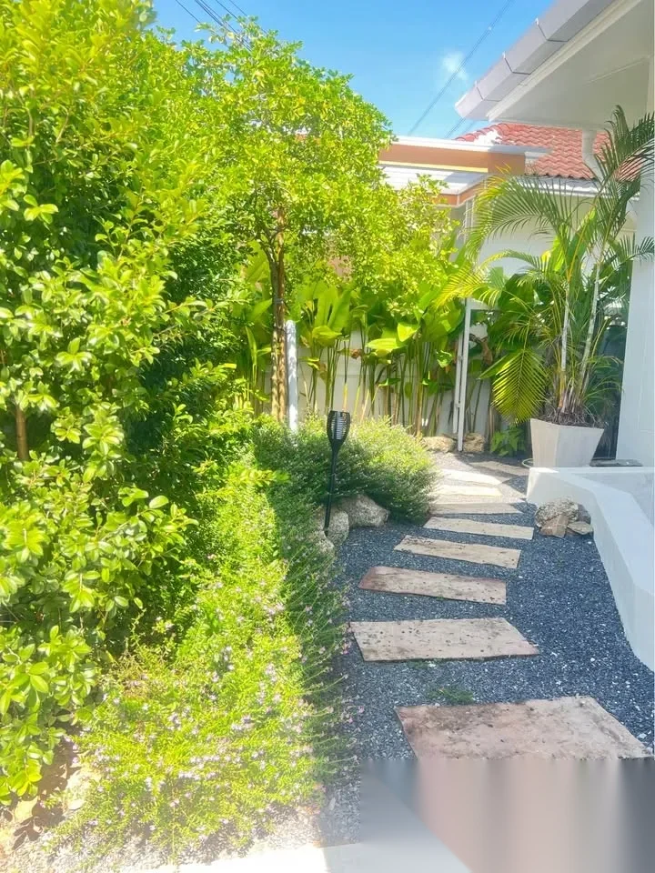 3 Bedroom House for rent at Baan Suan Neramit 1 complex · Si Sunthon · Garden View — photo 10