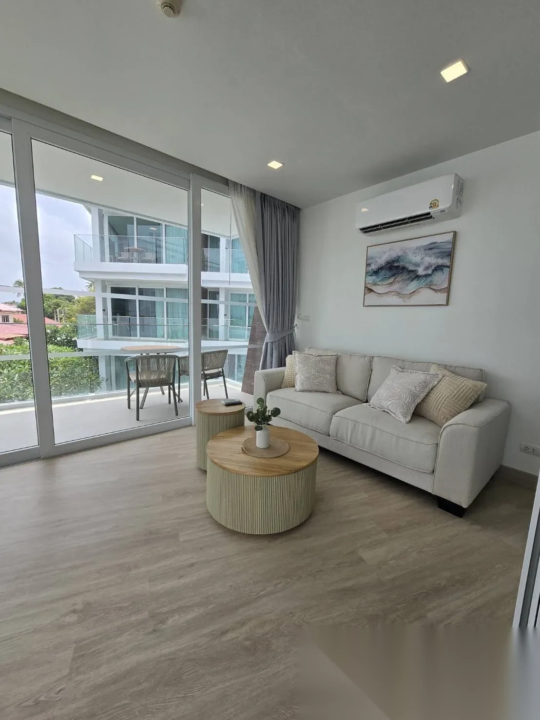 1 Bedroom Apartment for sale at The Beachfront complex · Rawai · Partial Sea View — photo 2