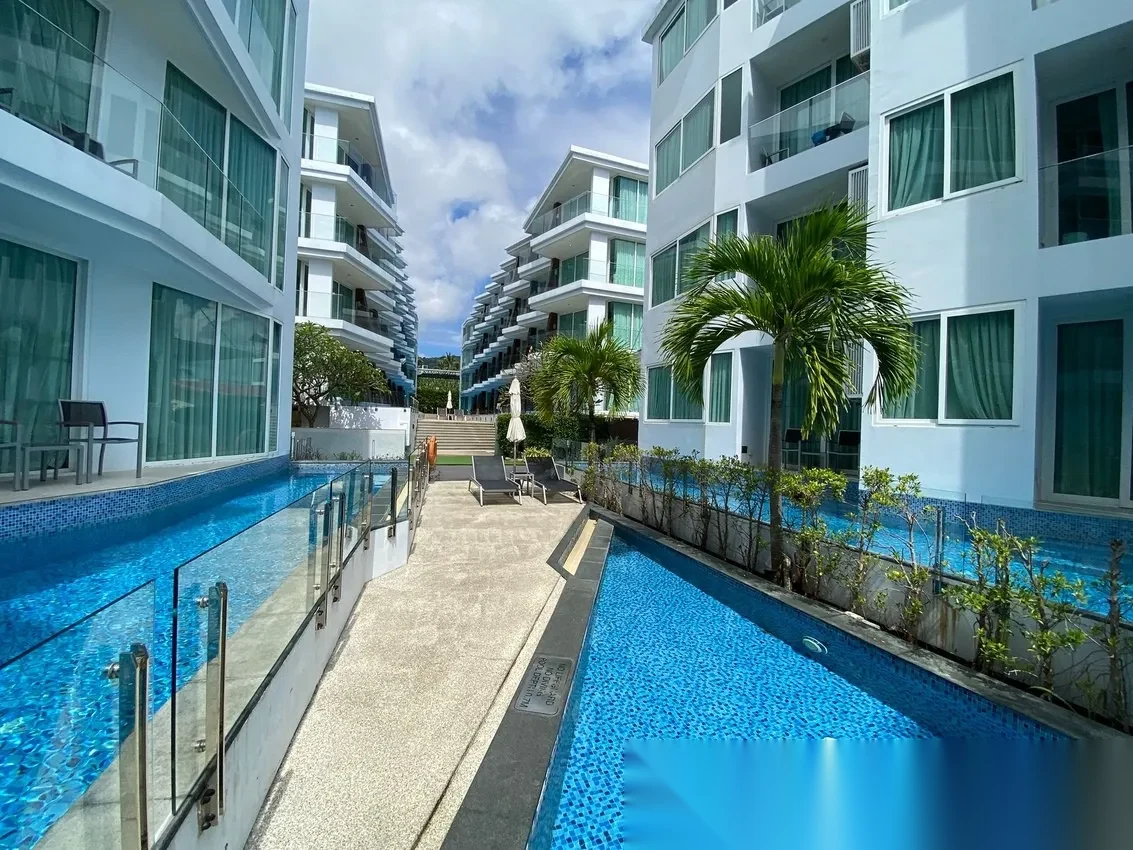 Апартаменты 1BR в ЖК The Beachfront · Раваи · Частичный вид на море — фото 5