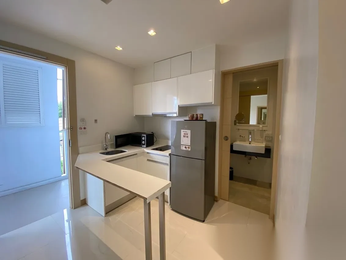 Апартаменты 1BR в ЖК The Beachfront · Раваи · Частичный вид на море — фото 11