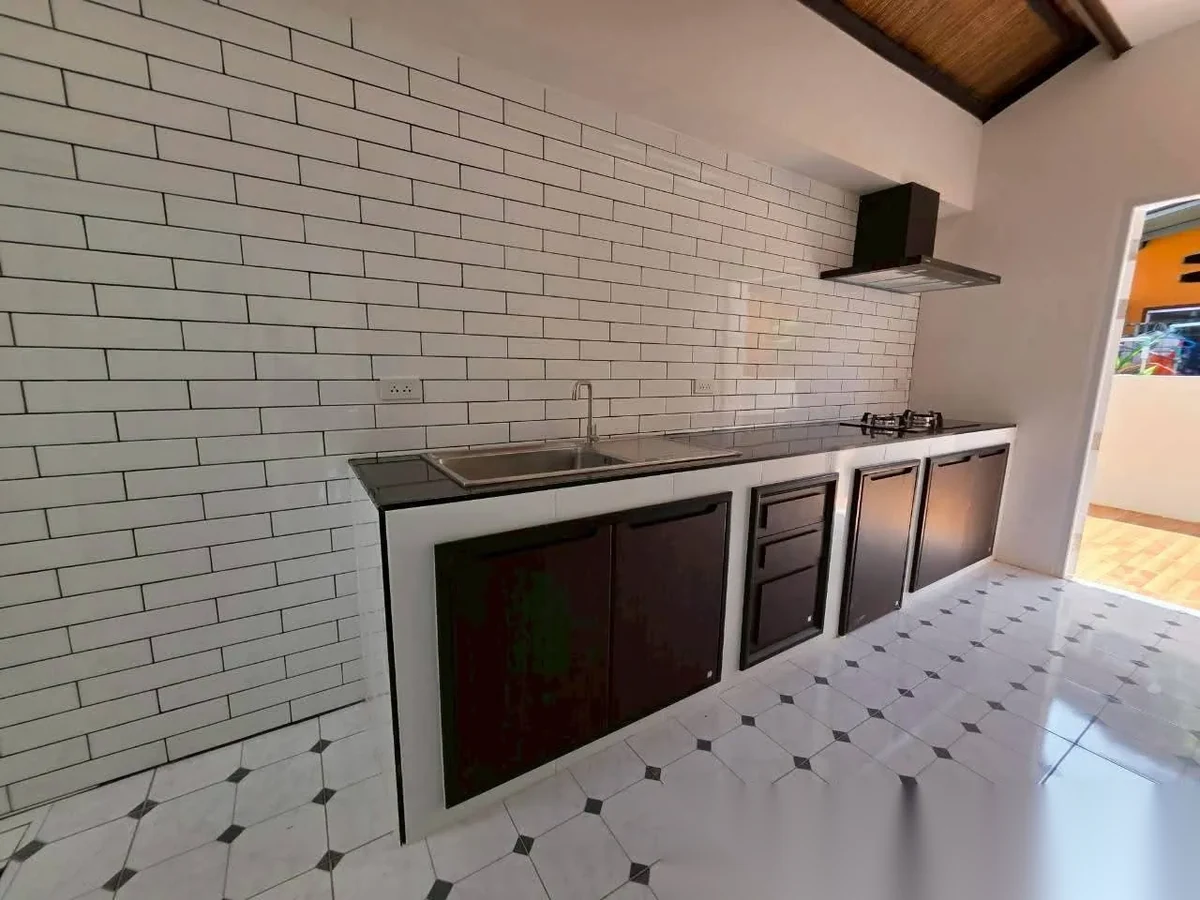 3 Bedroom House for sale at Phanason Park Ville 3 (Baan Lipon) complex · Si Sunthon · Garden View — photo 5