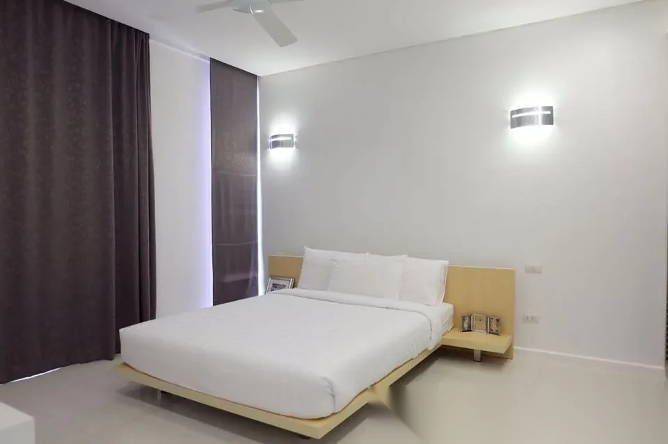 Апартаменты 2BR в ЖК Bangtao Beach Gardens · Чернг Тале / Bang Tao · Вид в сад — фото 5