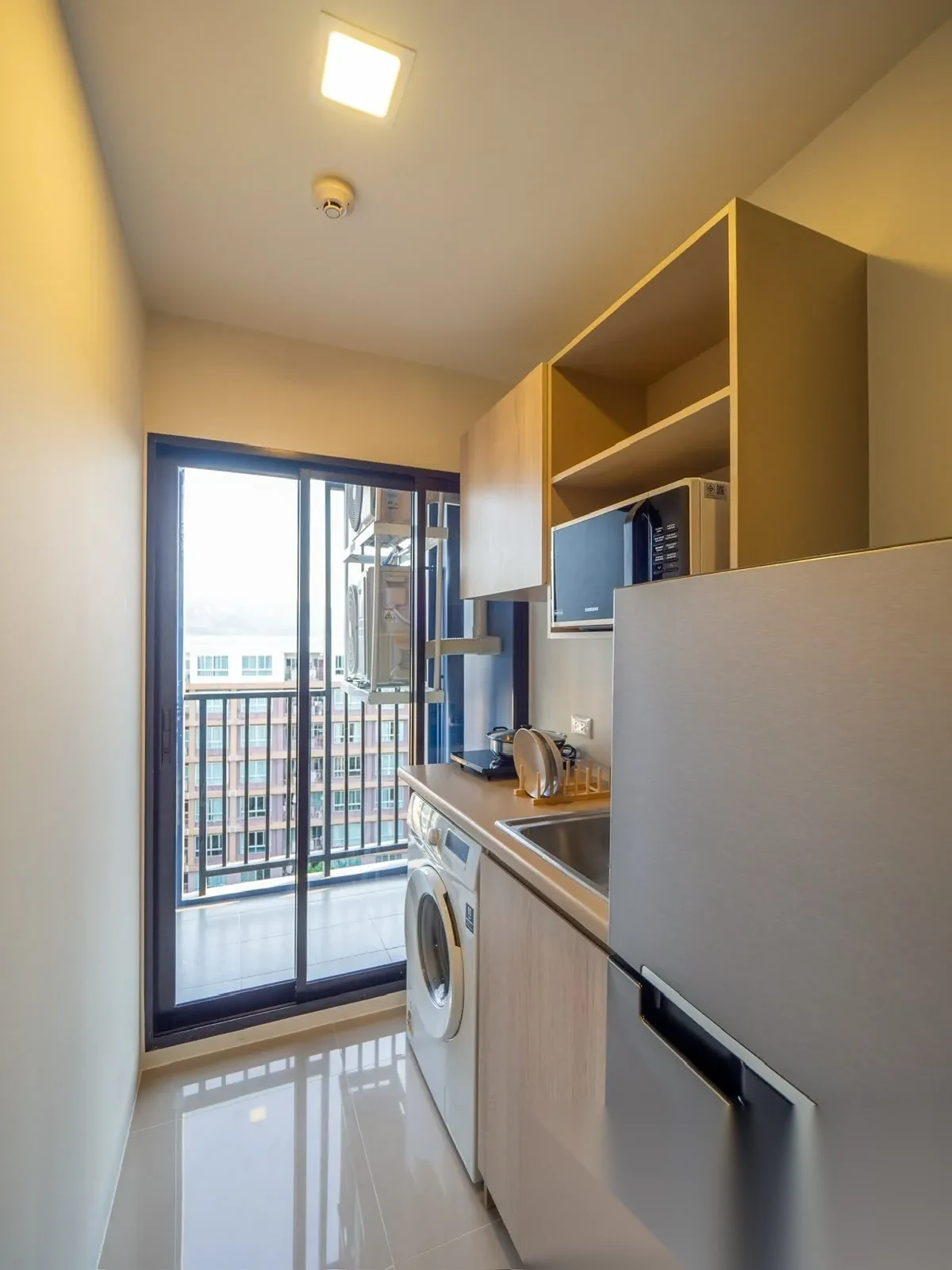Апартаменты 1BR в ЖК Dcondo Reef Phuket · Кату · Выход к бассейну — фото 9